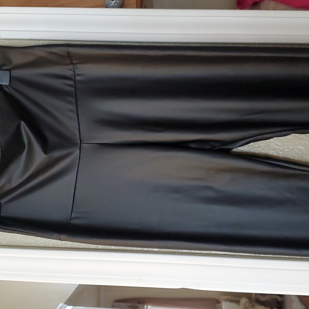 Leather Leggings size Large. NWT, never used, lost weight, down sizing.
